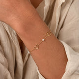 Scrouples - 8 kt. guld armbånd med hjerter og perler - Model: 34713A,M