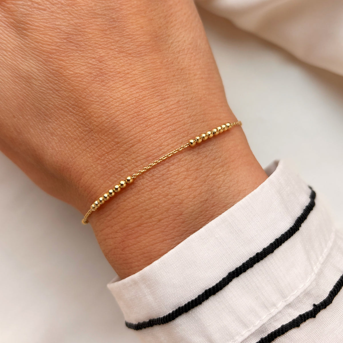 Scrouples - Armbånd forgyldt sølv, kugler på række - Model: 38842A,M