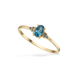 Scrouples - 8 kt guldring med blå topaser - Model: 714743
