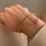 Scrouples-Molly armring kugler stål guldfarvet-model ST60007