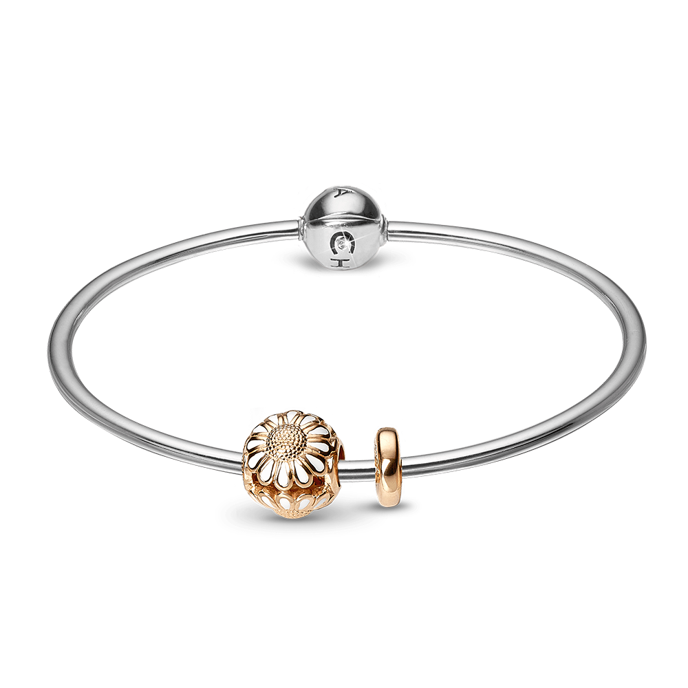 Køb Christina jewelry & watches - Sølv armring med en marguerit forgyldt sølv charm og en stopper - Modelnr.: 615-SB-G hos Guldsmed Smeds