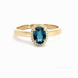 14 kt. guld diamantring med diamant, 0,06ct tw/si og London blue topaz 5x7mm - Model: 40-22645
