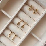 Scrouples - 8 kt guld ørestik med tre kugler - Model: 124403