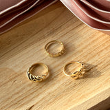 Scrouples - 8 kt guldring med snoet design- Model: 714283