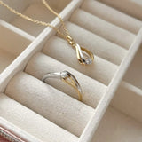 Scrouples - 8 kt. rød-og hvidguld ring med zirkonia - Model: 714664