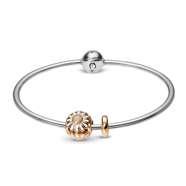 Køb Christina jewelry & watches - Sølv armring med en marguerit forgyldt sølv charm og en stopper - Modelnr.: 615-SB-G hos Guldsmed Smeds